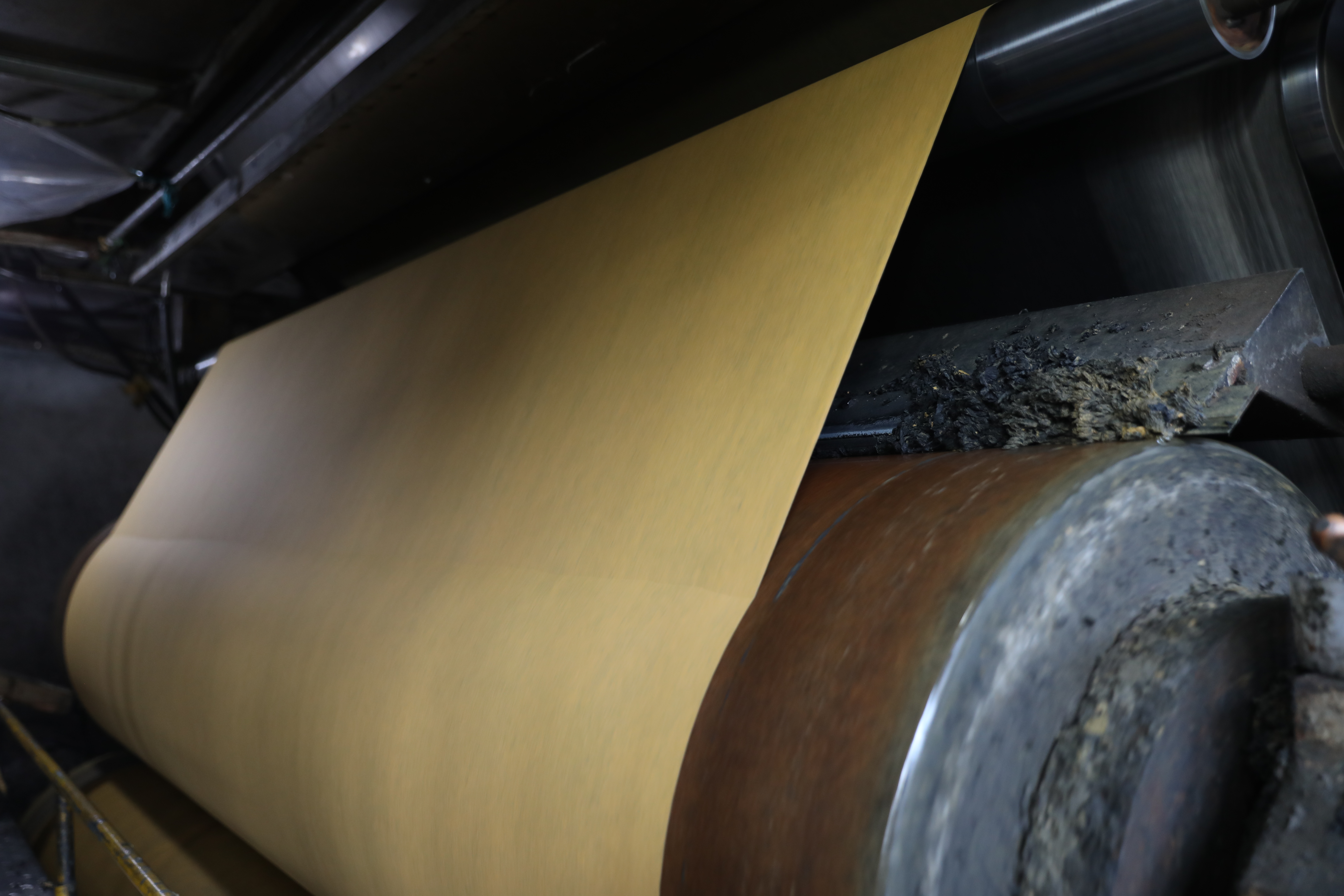 Outside brown/yellow inside black Composite Paper